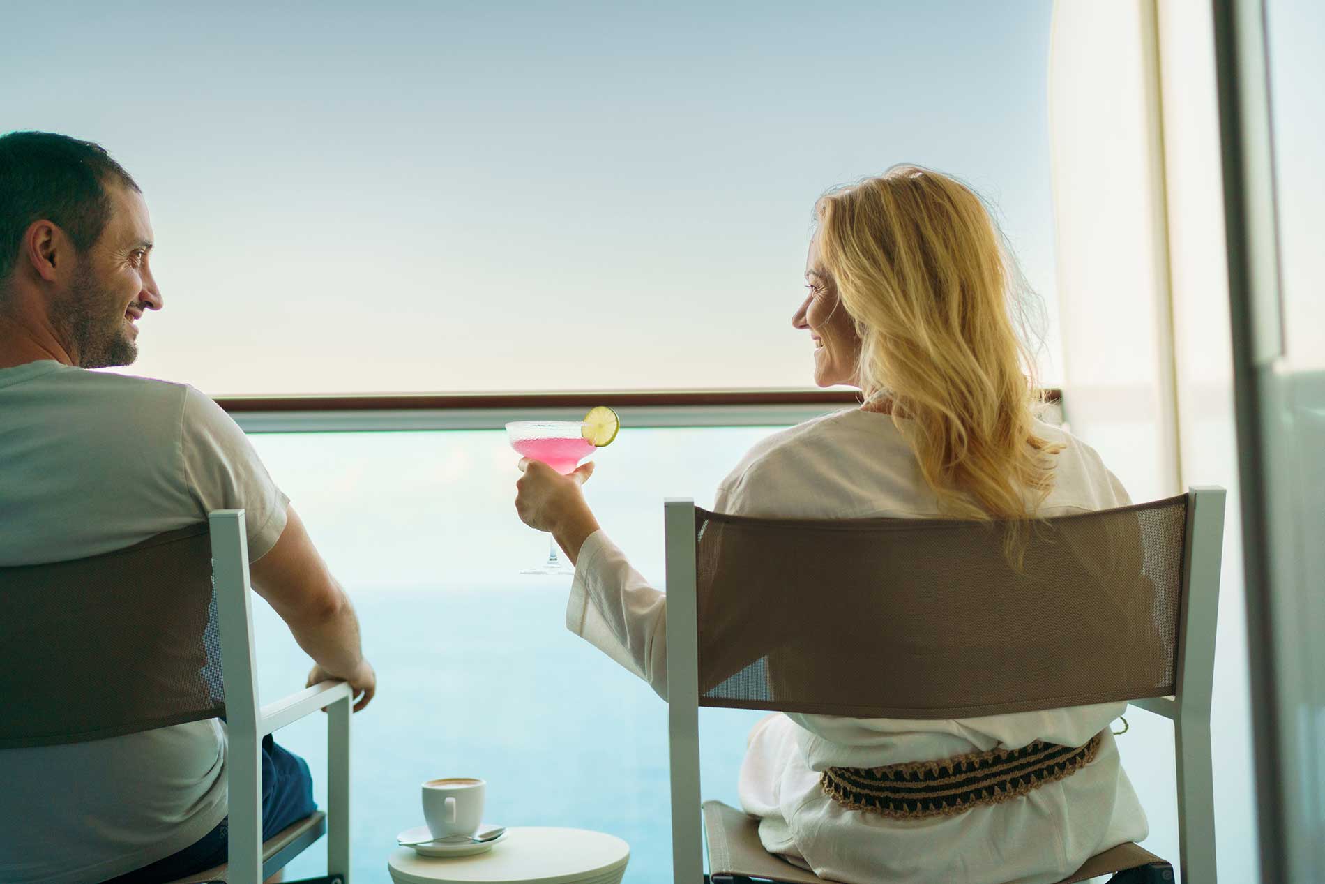 Relaxing on a cruise ship balcony overlooking the ocean