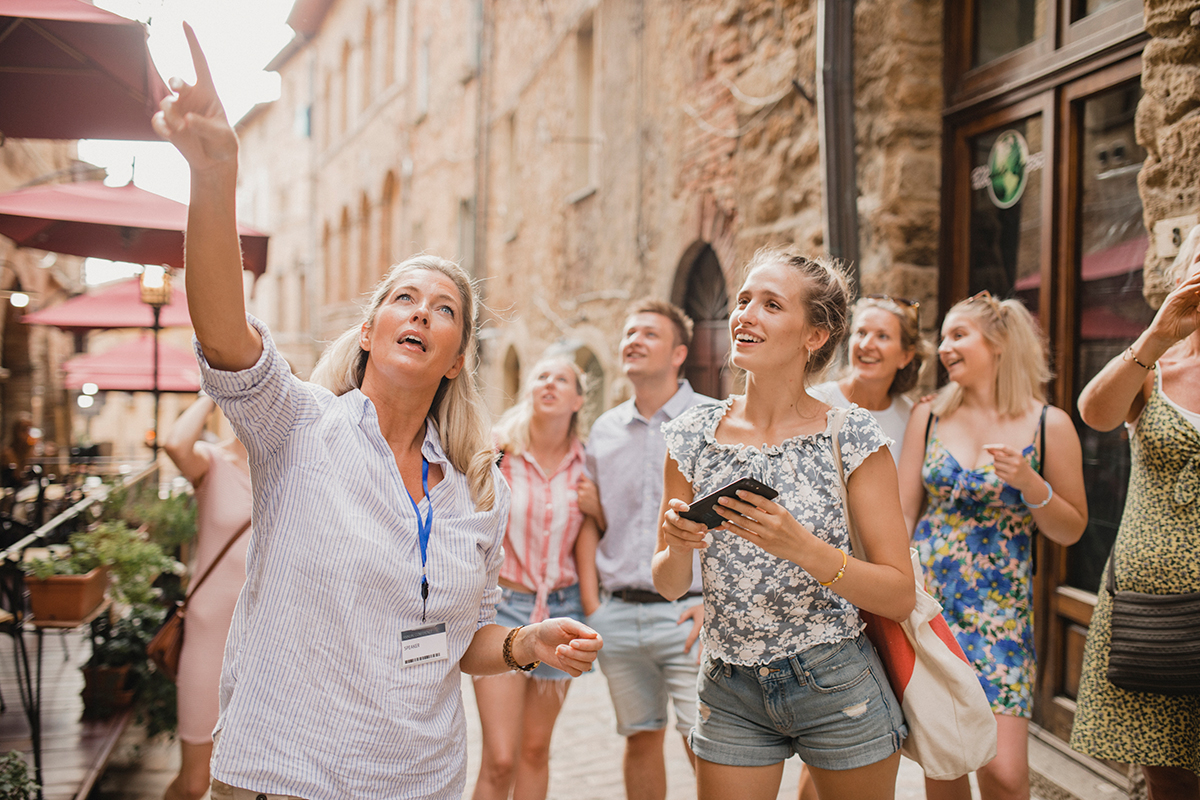Escorted tour group with a local guide in a European city